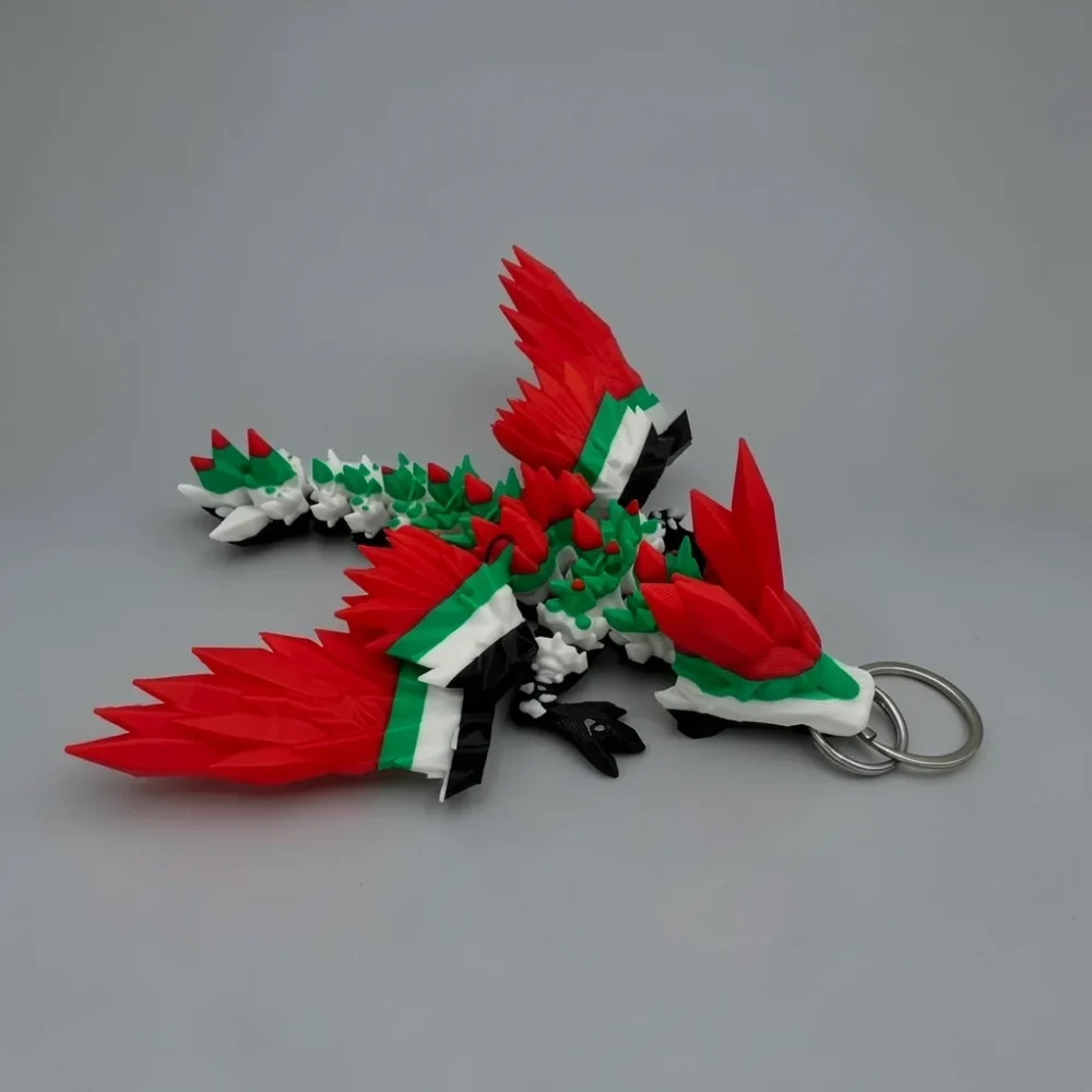 Winged Crystal Dragon: red and green dragon keychain figurine, silver metal keyring loops attached to snout
