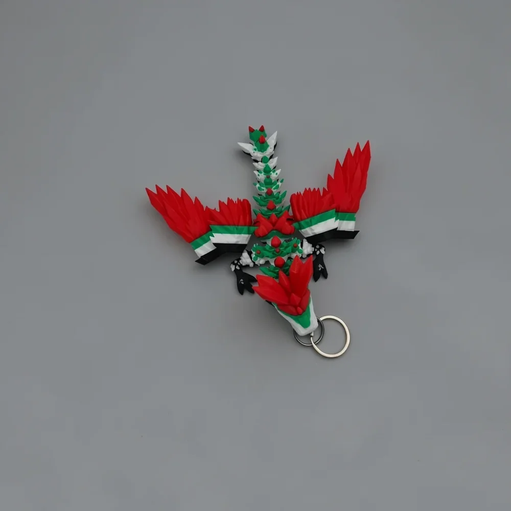 Winged Crystal Dragon: red and green dragon keychain figurine, prominent red crest on head