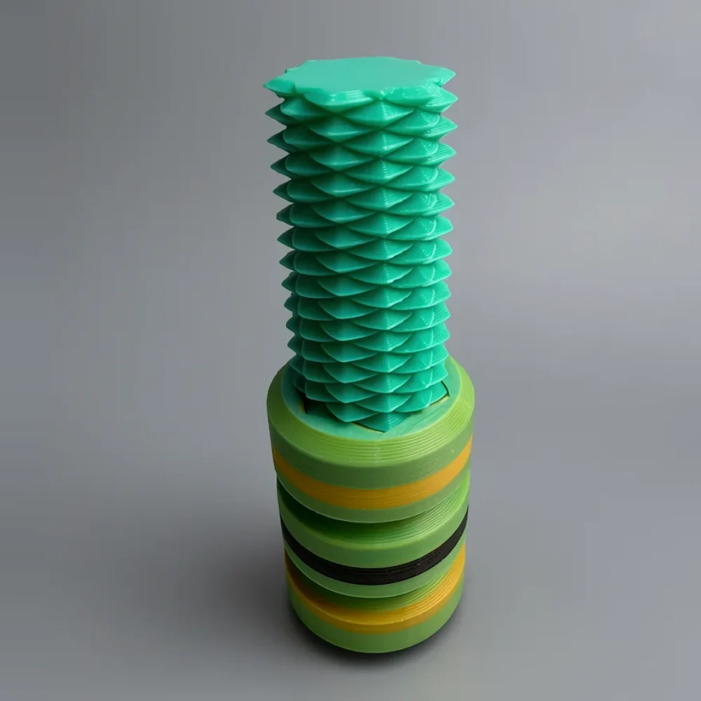 Two Way Screw: teal and lime green segmented geometric tower collectible