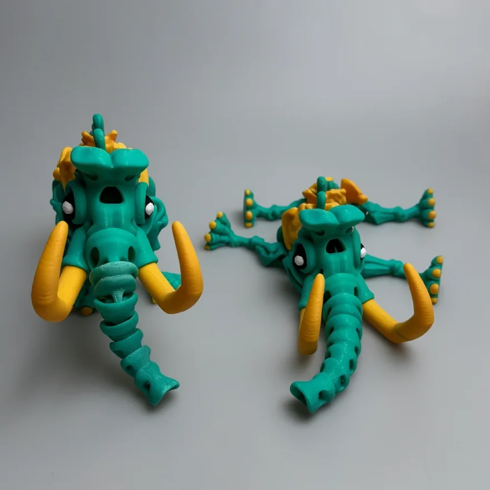 Skeleton Mammoth: teal and yellow stylized mammoth figurine, blocky teal head