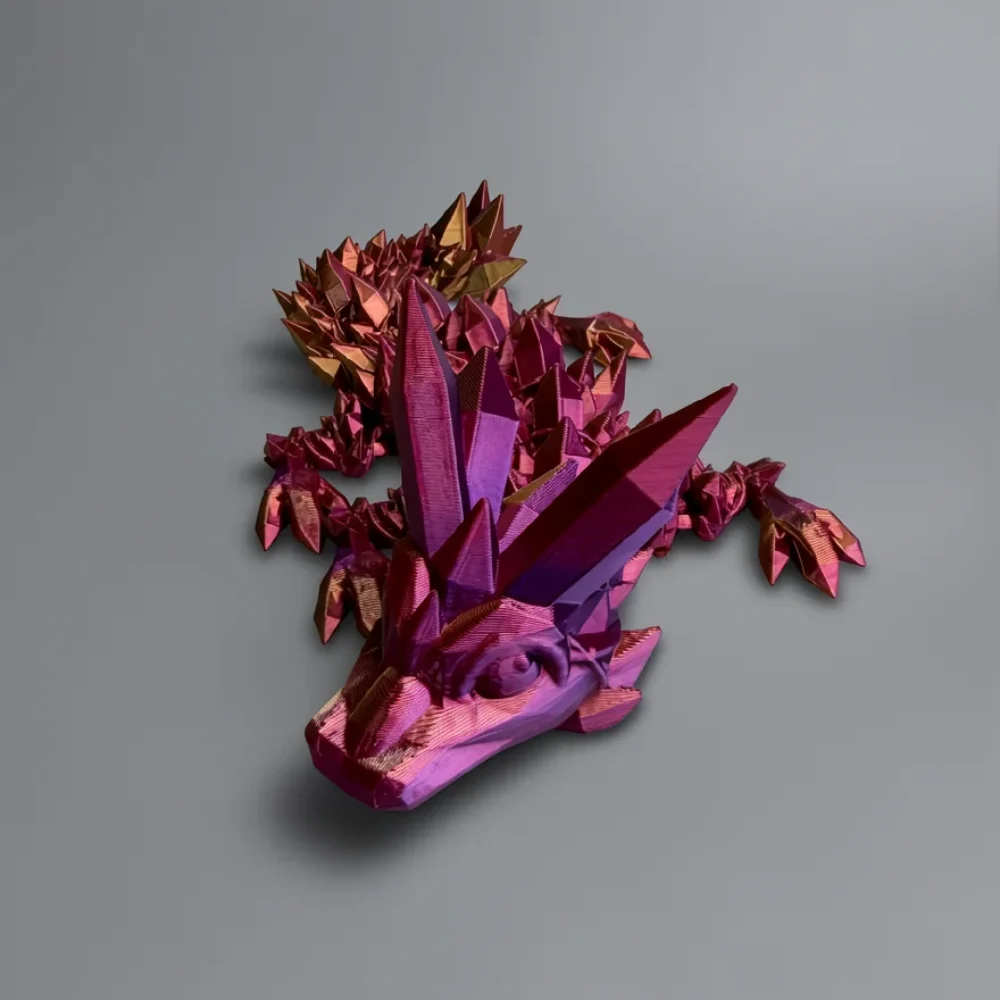 Baby Crystal Dragon: magenta and purple dragon figurine, low-poly geometric faceted design