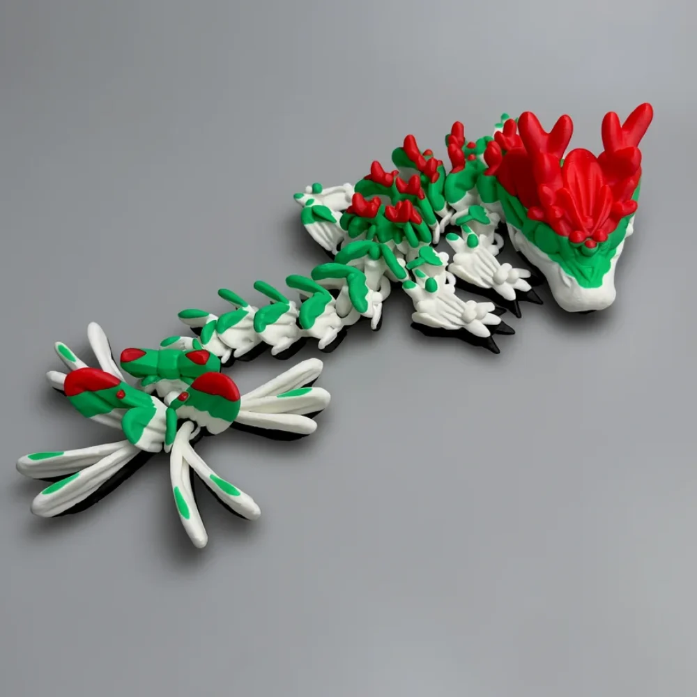 Mistletoe Dragon: white and black dragon figurine, red flame-like crest on head
