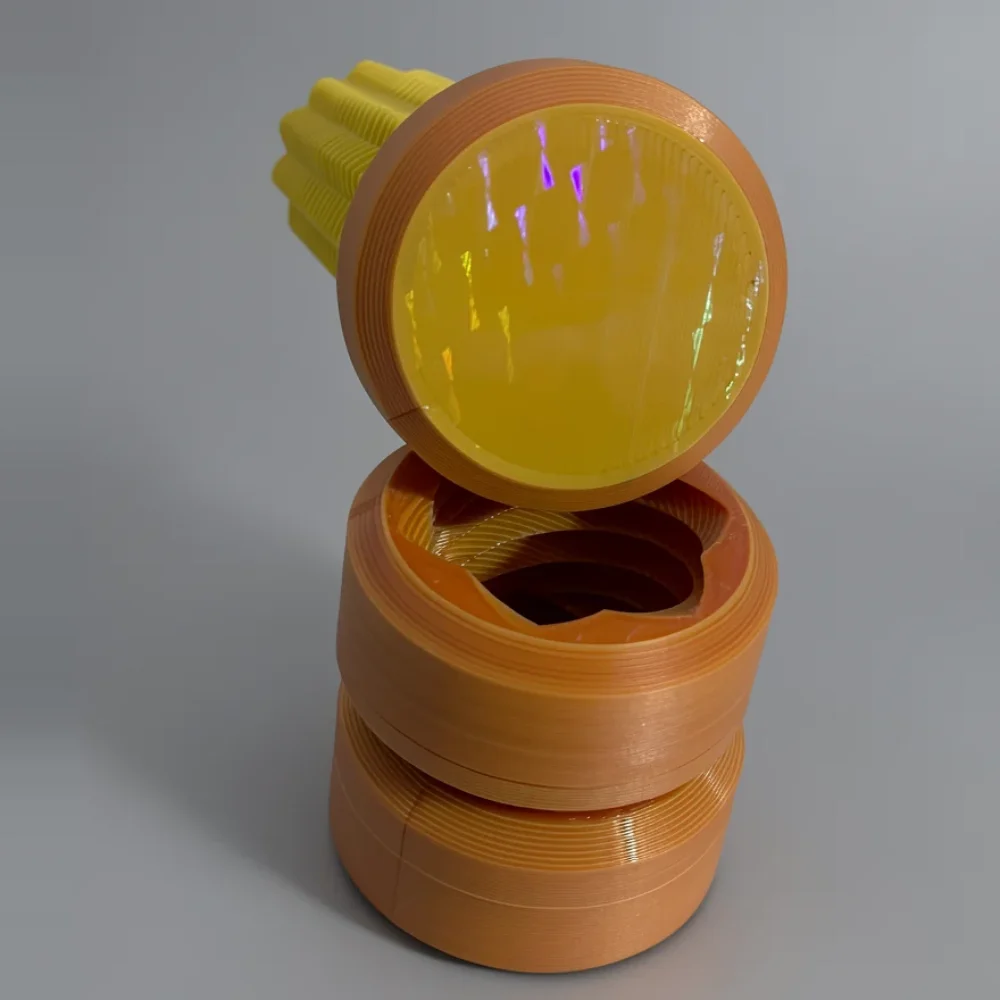 Two Way Screw: orange and yellow articulated mechanical component with two stacked sections