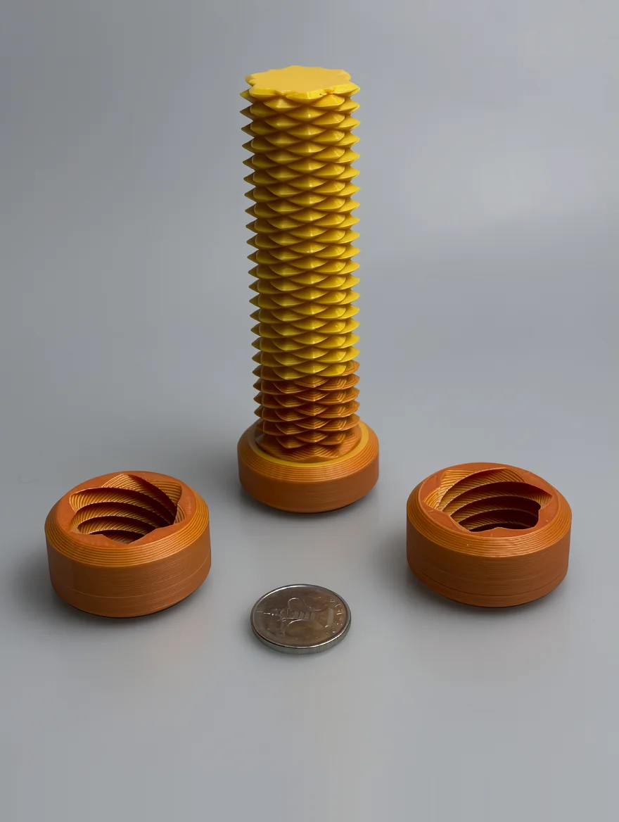 Two Way Screw: orange and yellow articulated mechanical column with connector caps