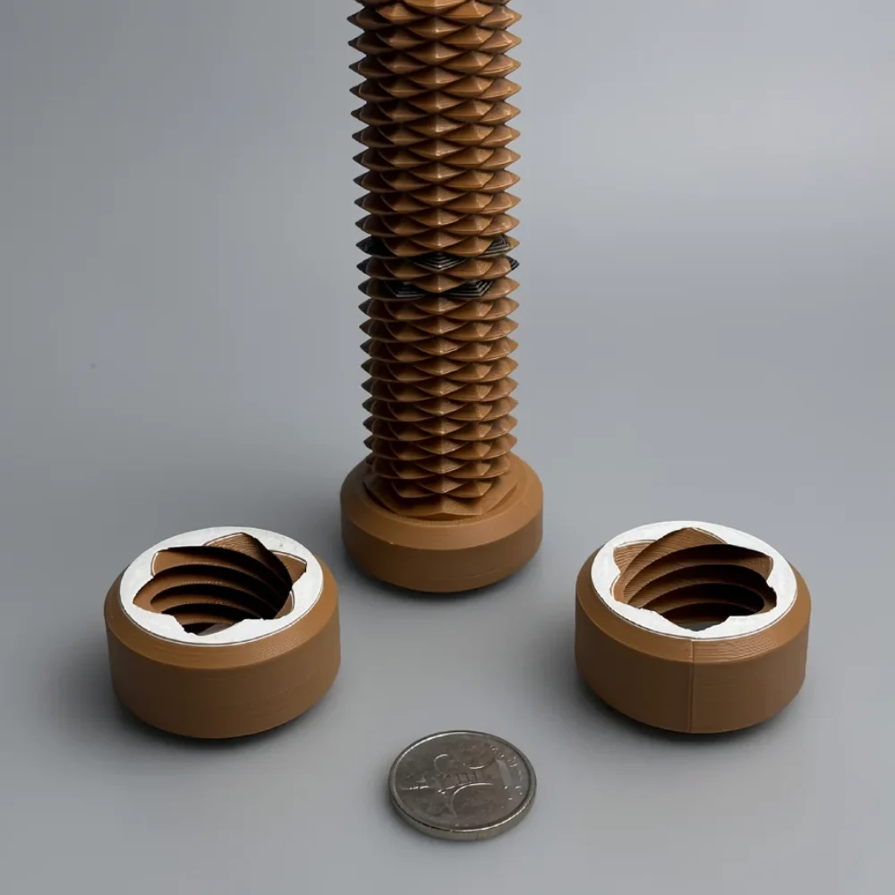 Two Way Screw: tan and white geometric sculpture with flexible lattice column and detached cylindrical caps