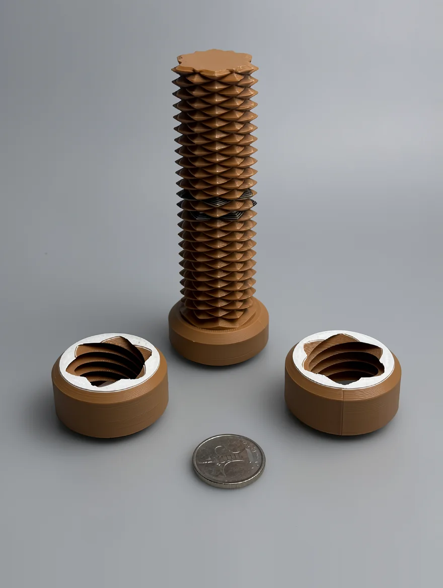 Two Way Screw: tan and white geometric sculpture with flexible lattice column and detached cylindrical caps
