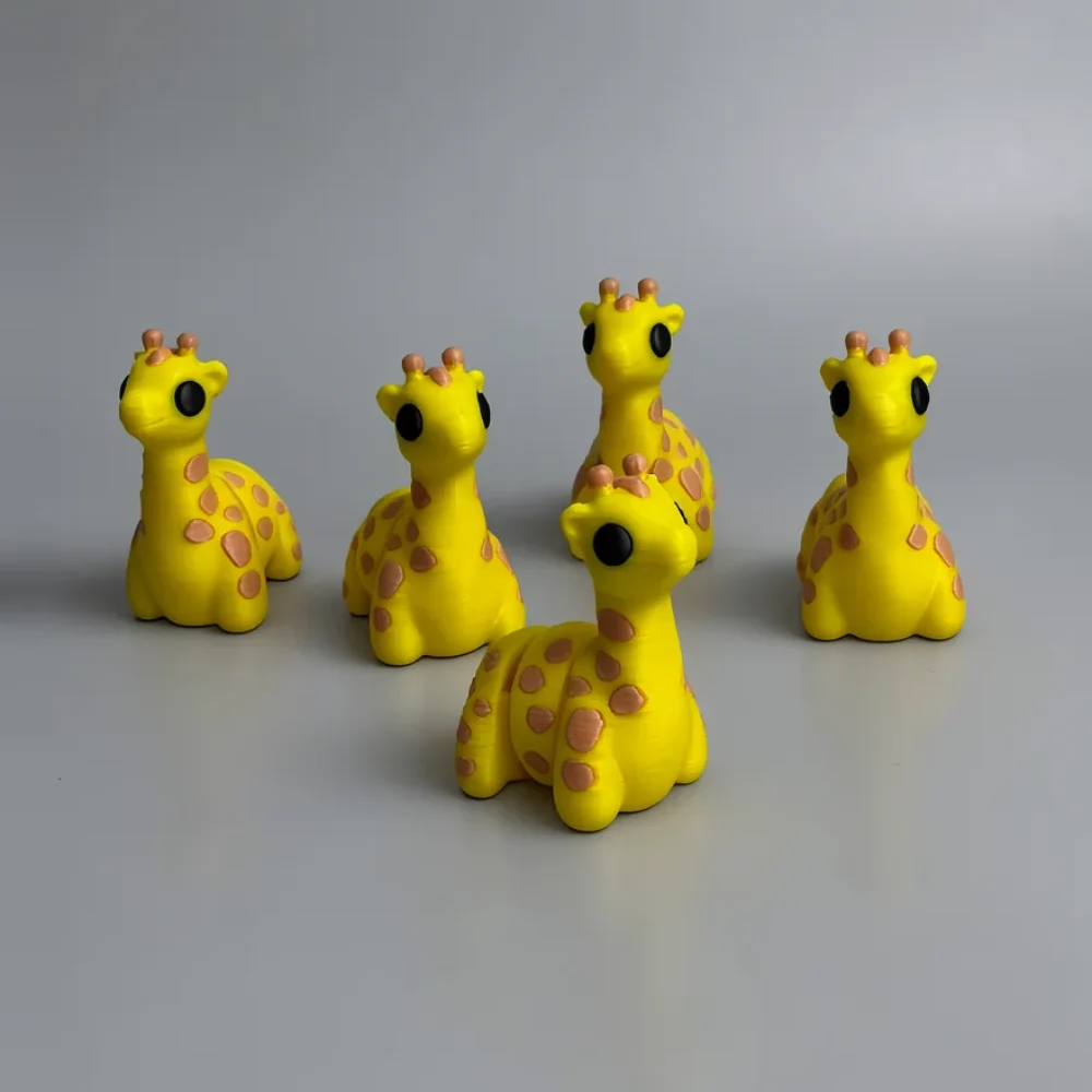 Baby Giraffe: yellow and tan set of five small sitting giraffe figurines