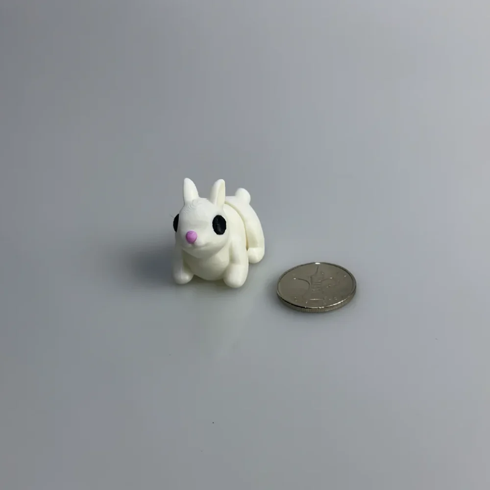 Baby Bunny: cream and black rabbit figurine, two upright pointed ears