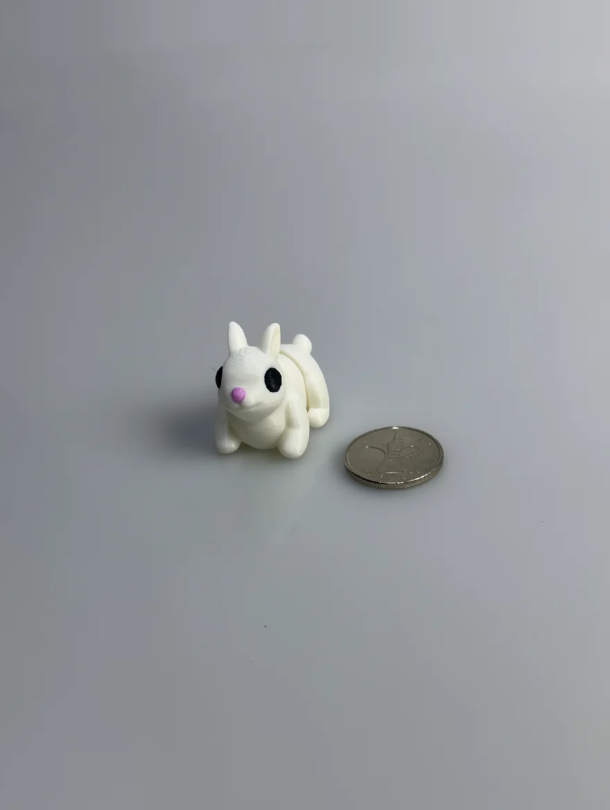 Baby Bunny: cream and black rabbit figurine, two upright pointed ears