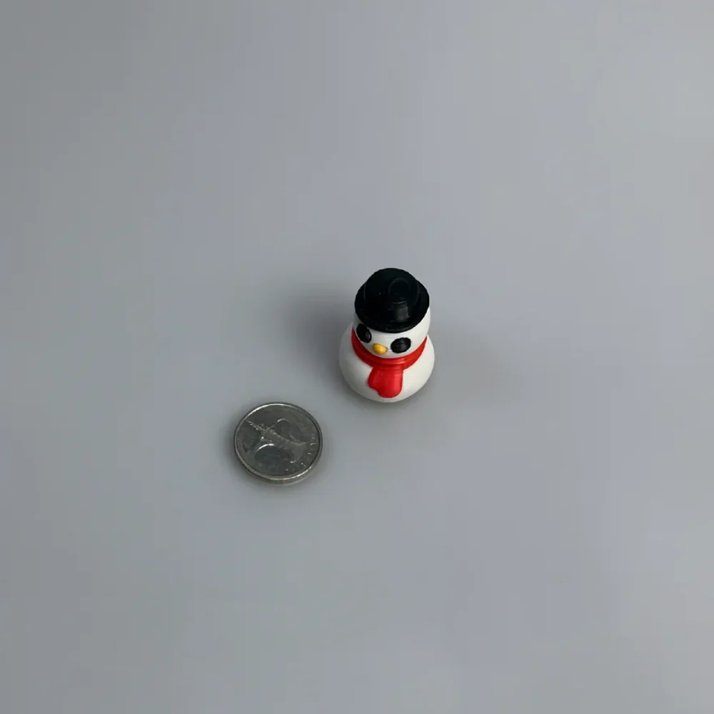 Snowman Sculpture: white and black snowman figurine, black top hat with brim and cylindrical crown