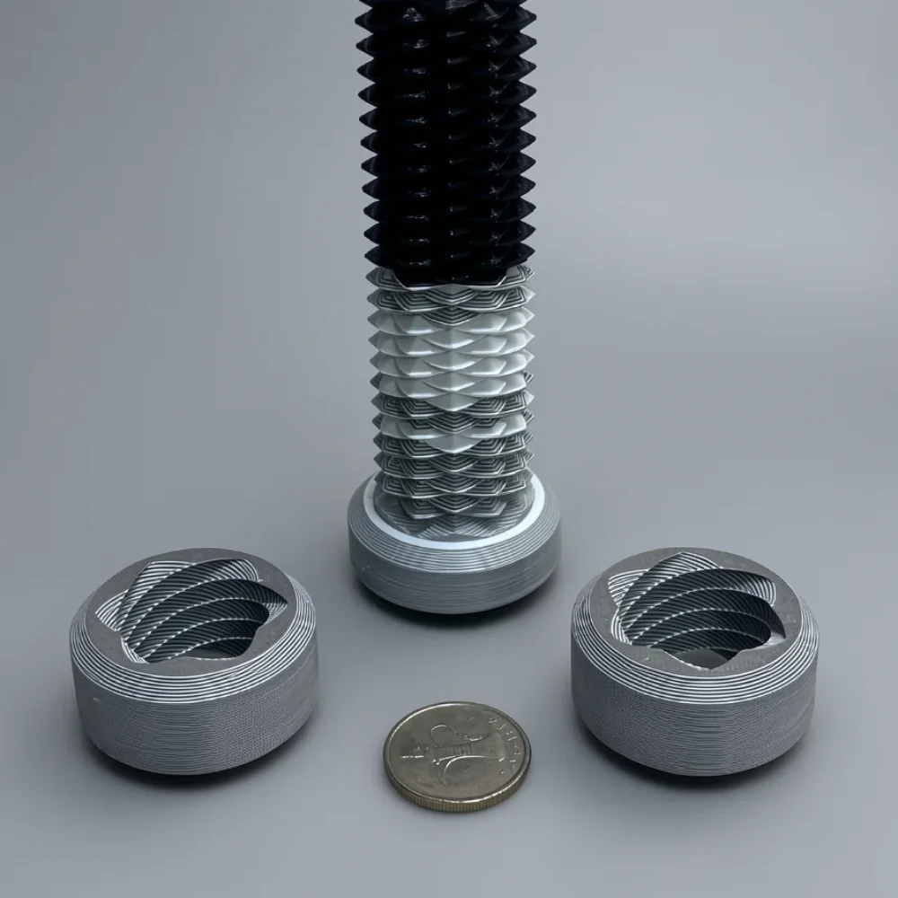 Two Way Screw: black and white segmented geometric cylinder assembly with two flanking hollow cylinders