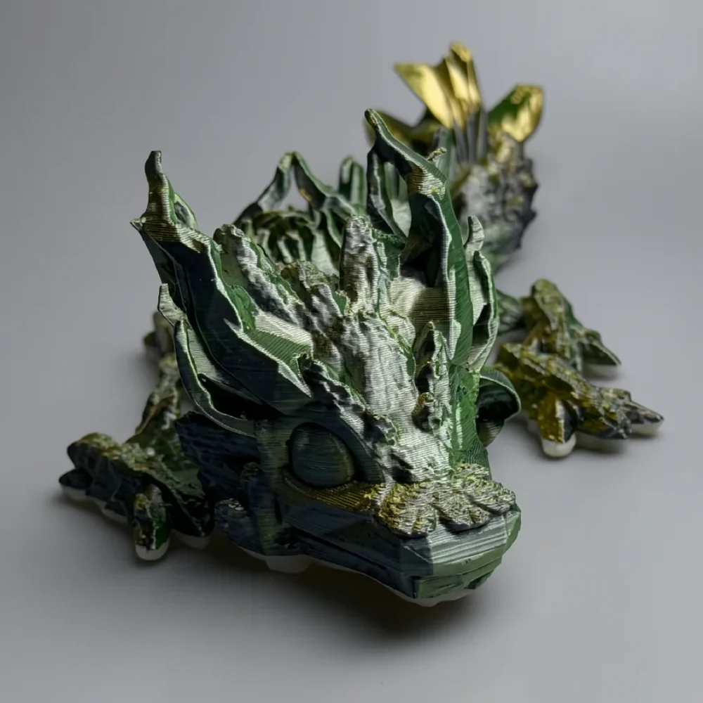 Woodland Dragon: green and gold leaf dragon figurine, leaf-like textured surface mimicking foliage and vines
