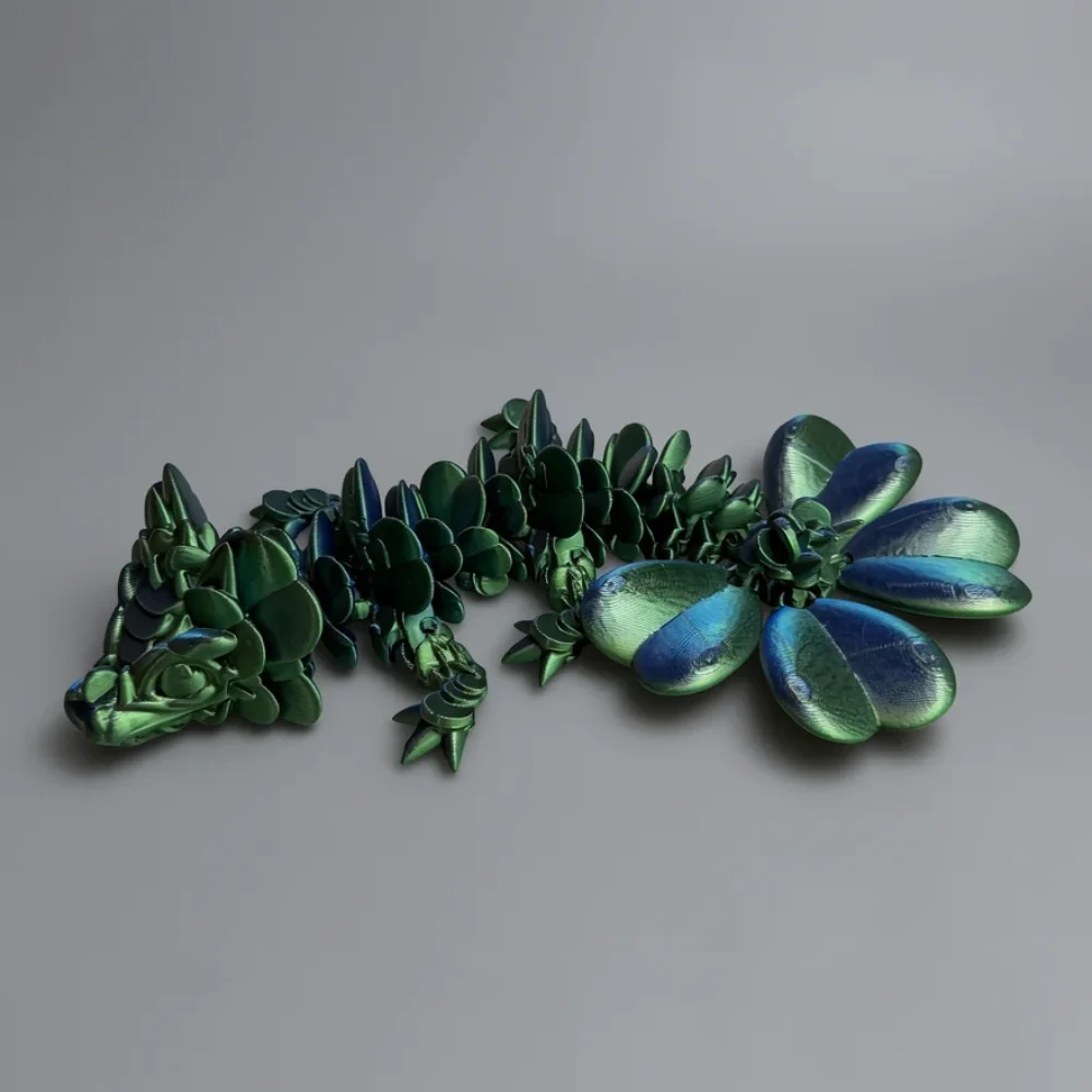 Baby Lucky Clover Dragon: emerald green and teal decorative botanical sculpture, dense thicket of small overlapping leaves