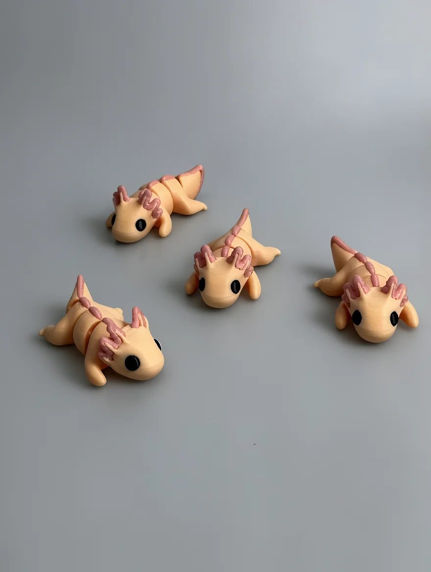 Baby Axolotl: pale peach and dusty pink articulated segmented axolotl figurines (flexi-style)