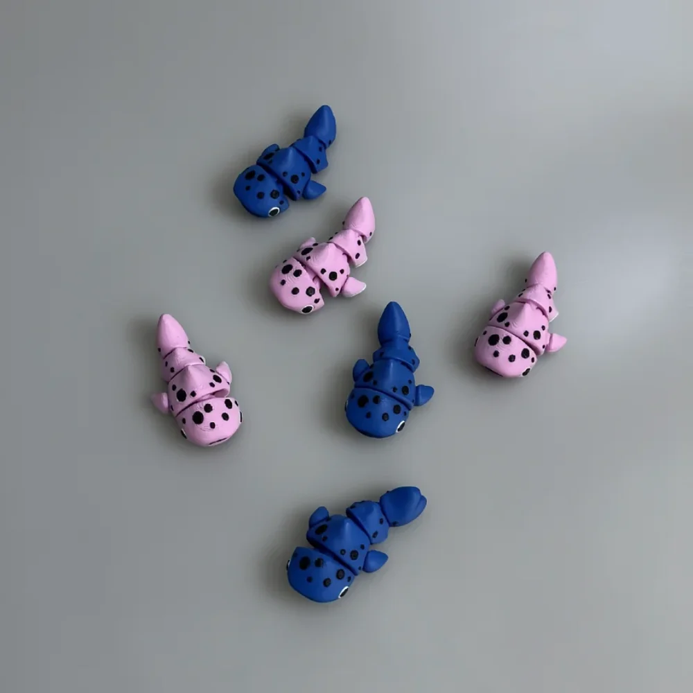 Tiny Spoted Whale Shark: blue and pink articulated shark figurine, black polka dots across body