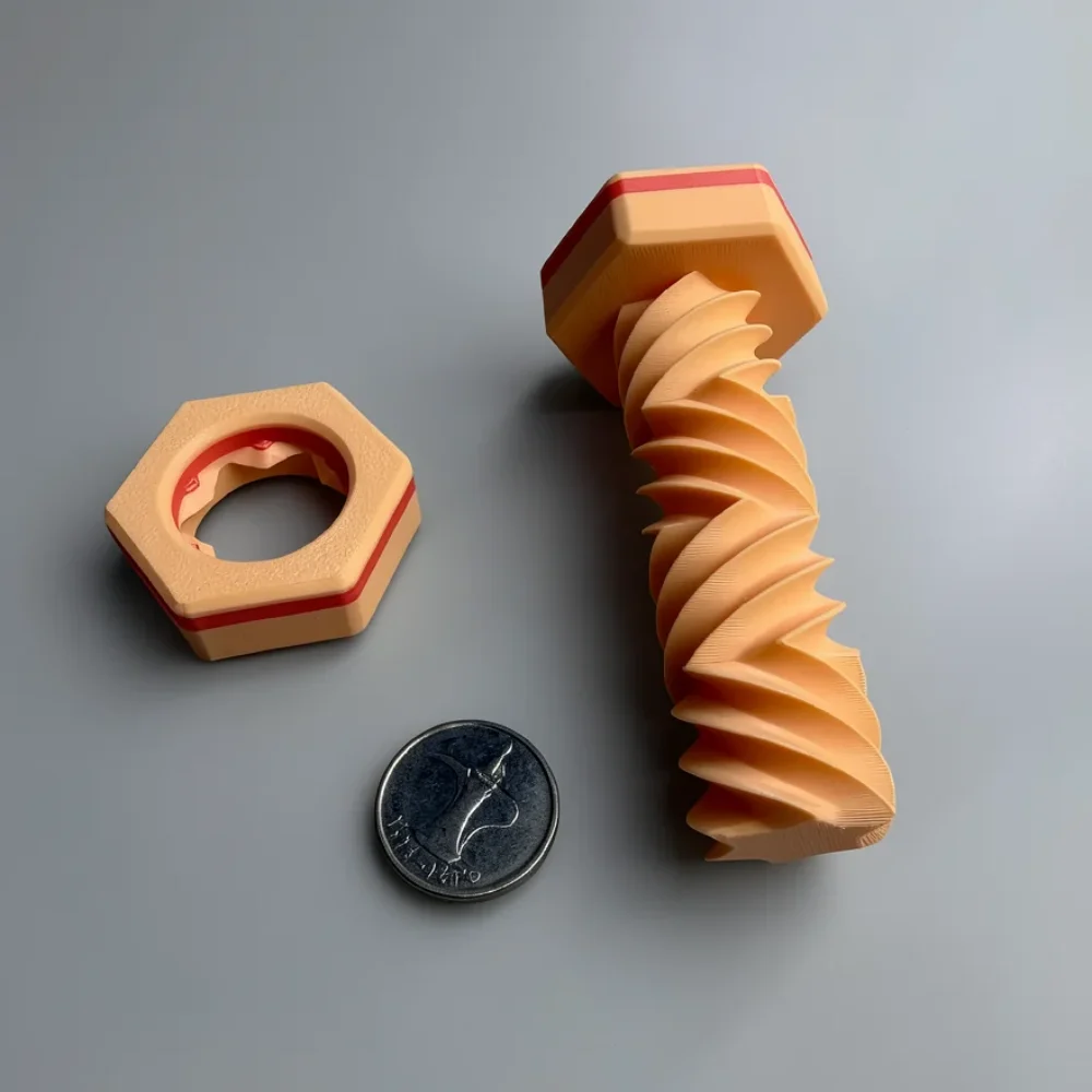 Zigzag Bolt Nut: peach and red oversized bolt and nut figurine set, oversized hexagonal bolt head