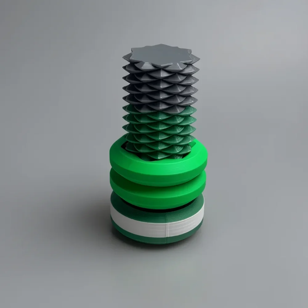 Two Way Screw: dark grey and green spiral mechanical sculpture, star-shaped top surface
