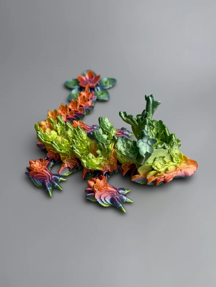 Baby Cherry Blossom Dragon: green and yellow 3D-printed decorative number "4" sculpture composed of succulent-like petal…