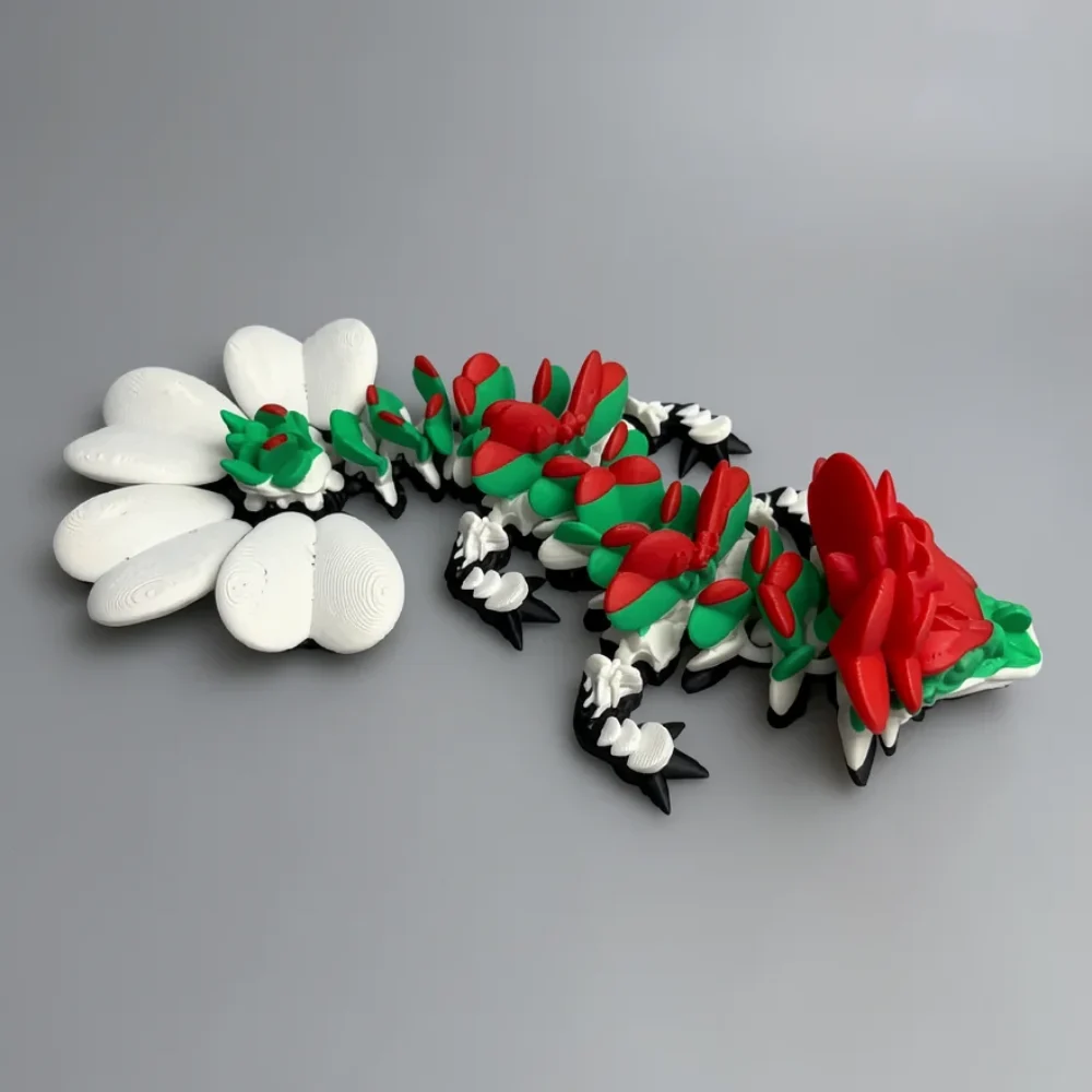 Baby Lucky Clover Dragon: white and black segmented floral creature figurine