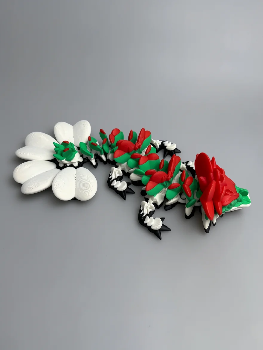 Baby Lucky Clover Dragon: white and black segmented floral creature figurine