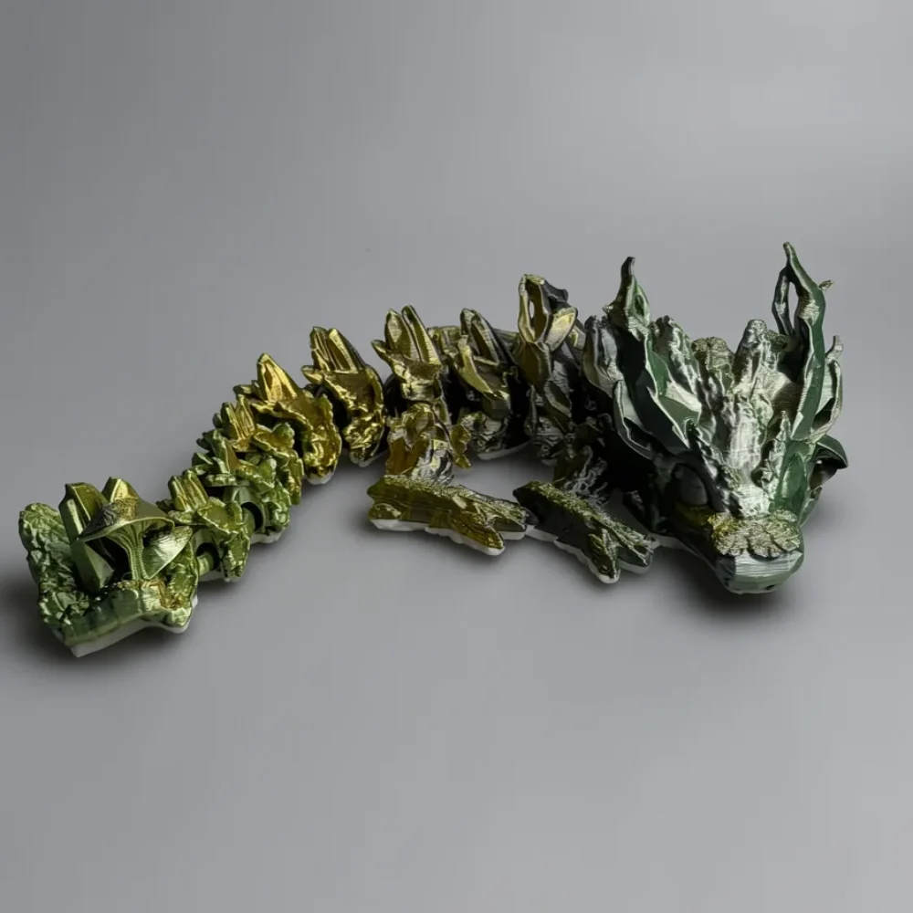 Woodland Dragon: gold and green articulated dragon spine figurine, low-poly faceted surface