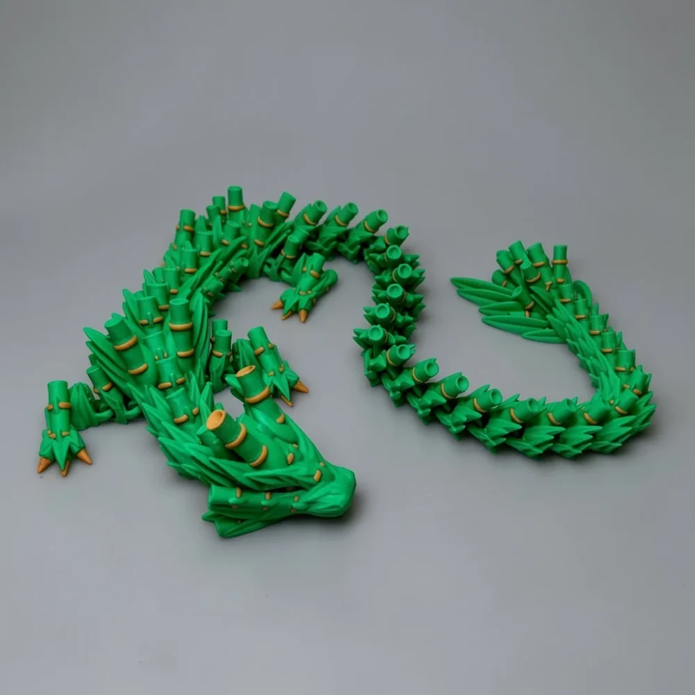 Bamboo Dragon: green and mustard-yellow segmented bamboo-themed dragon figurine
