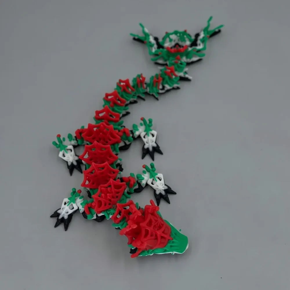 Baby Wicked Dragon: green and red articulated flexi dragon figurine