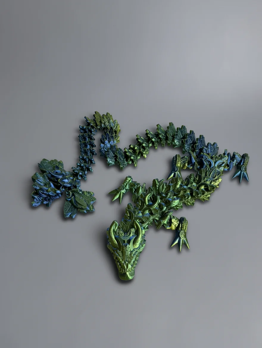 Lunar Dragon: forest green and lime green articulated dragon figurine, backward-sweeping horns