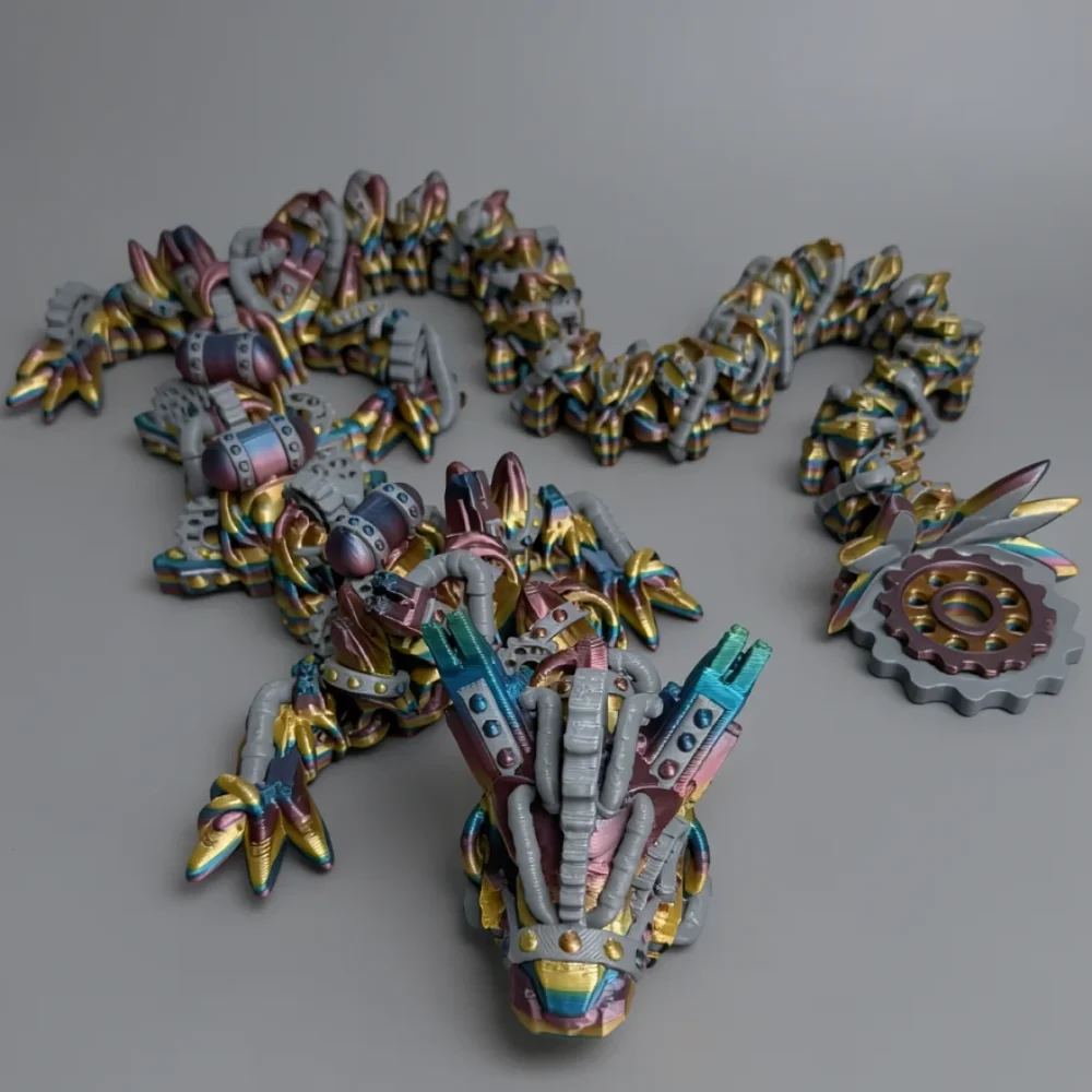 Steampunk Dragon: gold and grey articulated mechanical dragon figurine, pointed armored snout