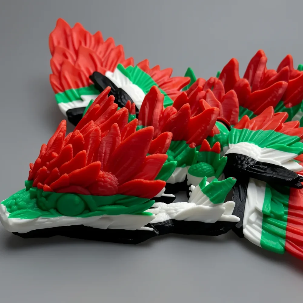 Baby Winged Sunflower Dragon: red and green dragon figurine, flame-like red spikes along crest and body