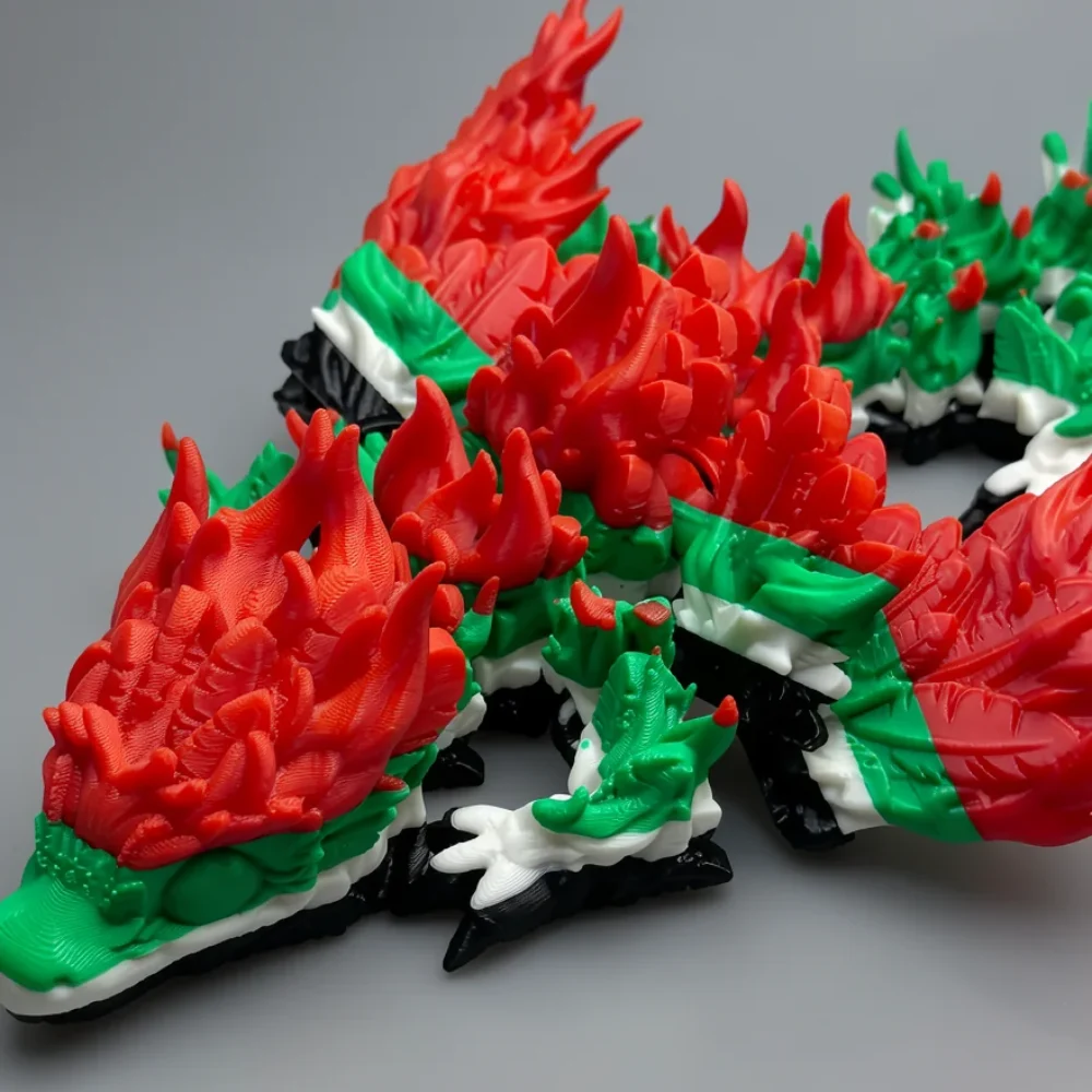 Baby Phoenix Dragon: red and green segmented dragon figurine