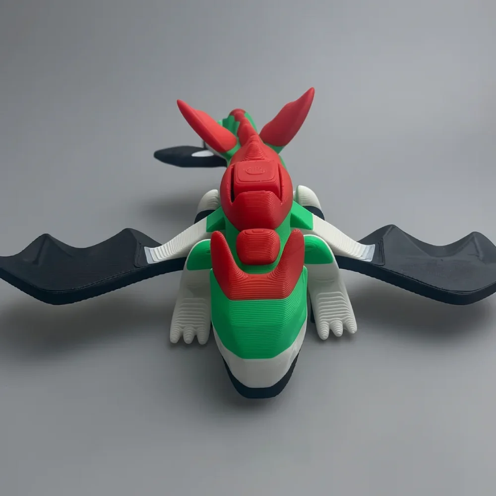 Flapping UAE Dragon: green and red 3D-printed dragon figurine