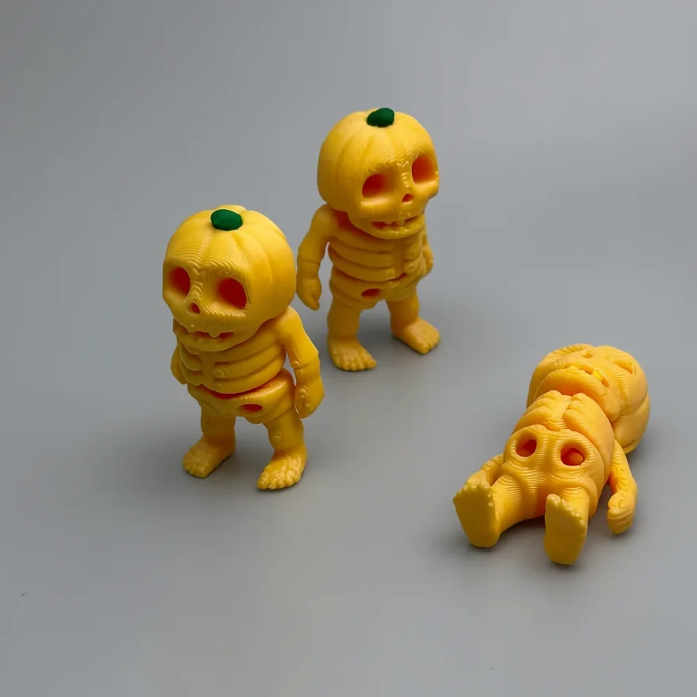 Tiny Pumpkin Skeleton: yellow and green pumpkin skeleton figurine, pumpkin-shaped head with vertical ridges