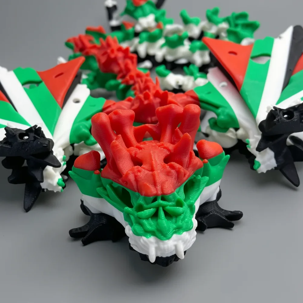 Baby Winged Hollow Dragon: red and green dragon figurine, large red crest/mane on head